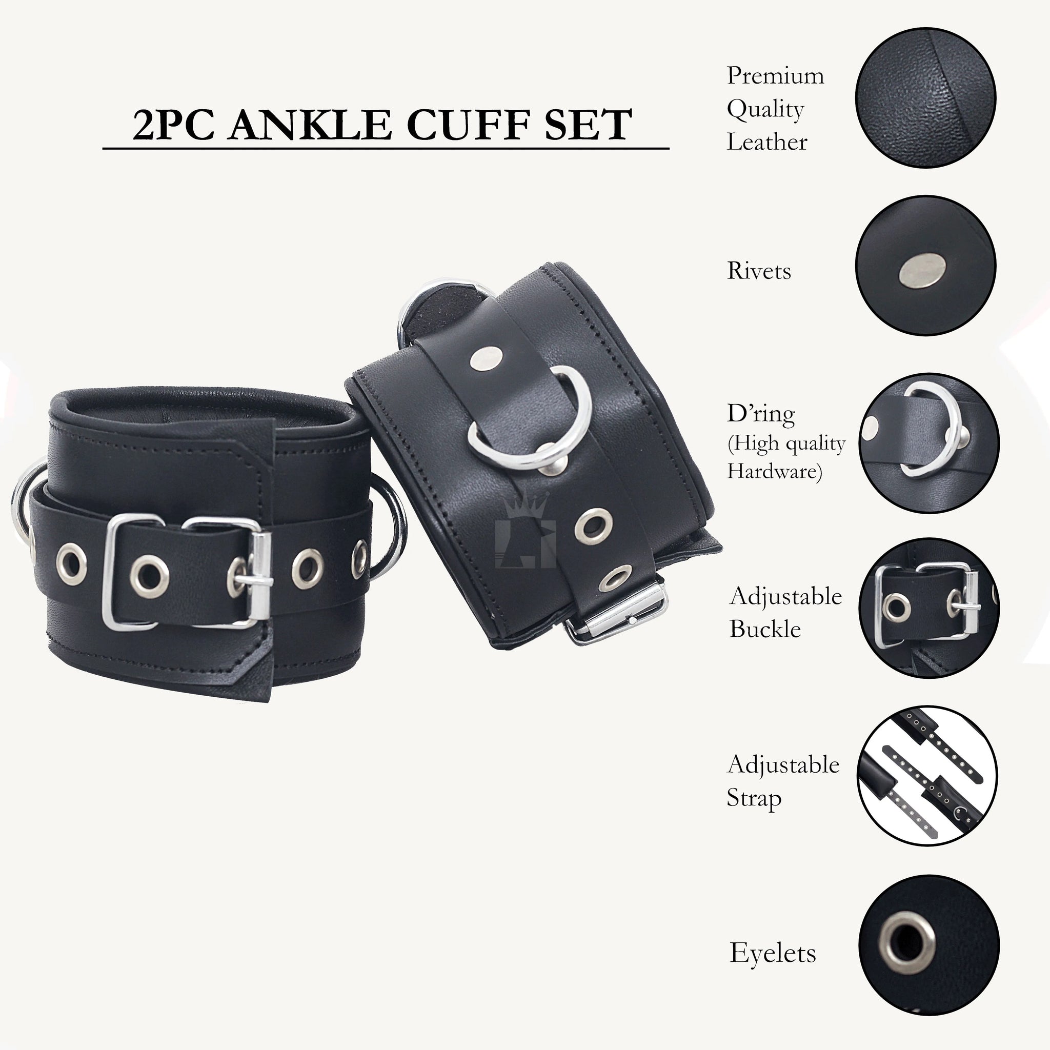 A set of black leather bondage handcuffs with metal buckles and eyelets, arranged on a white surface.