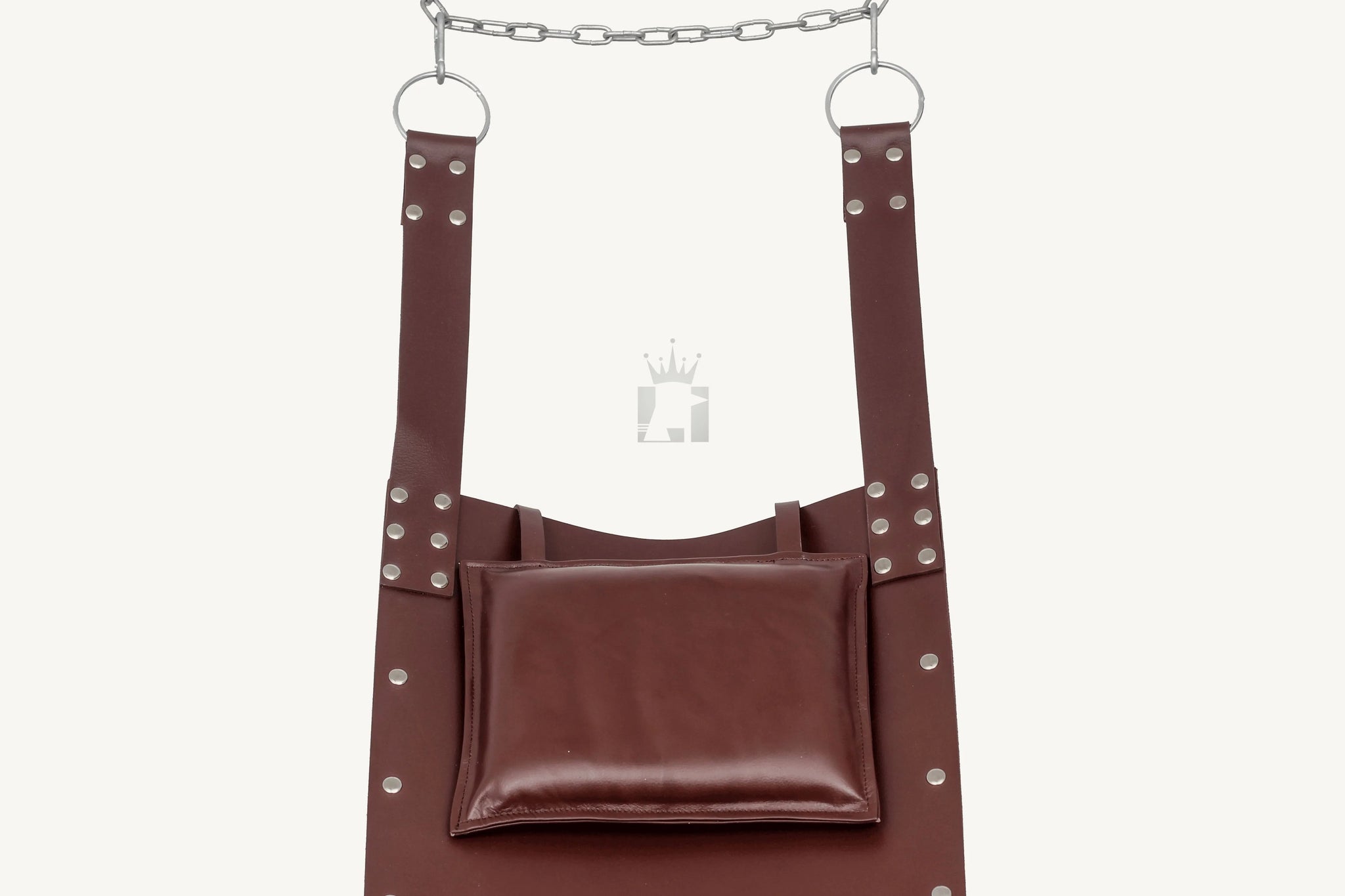 front angle view of black leather sex swing with pillow, leg loops and d'rings, nickel-plated reverts