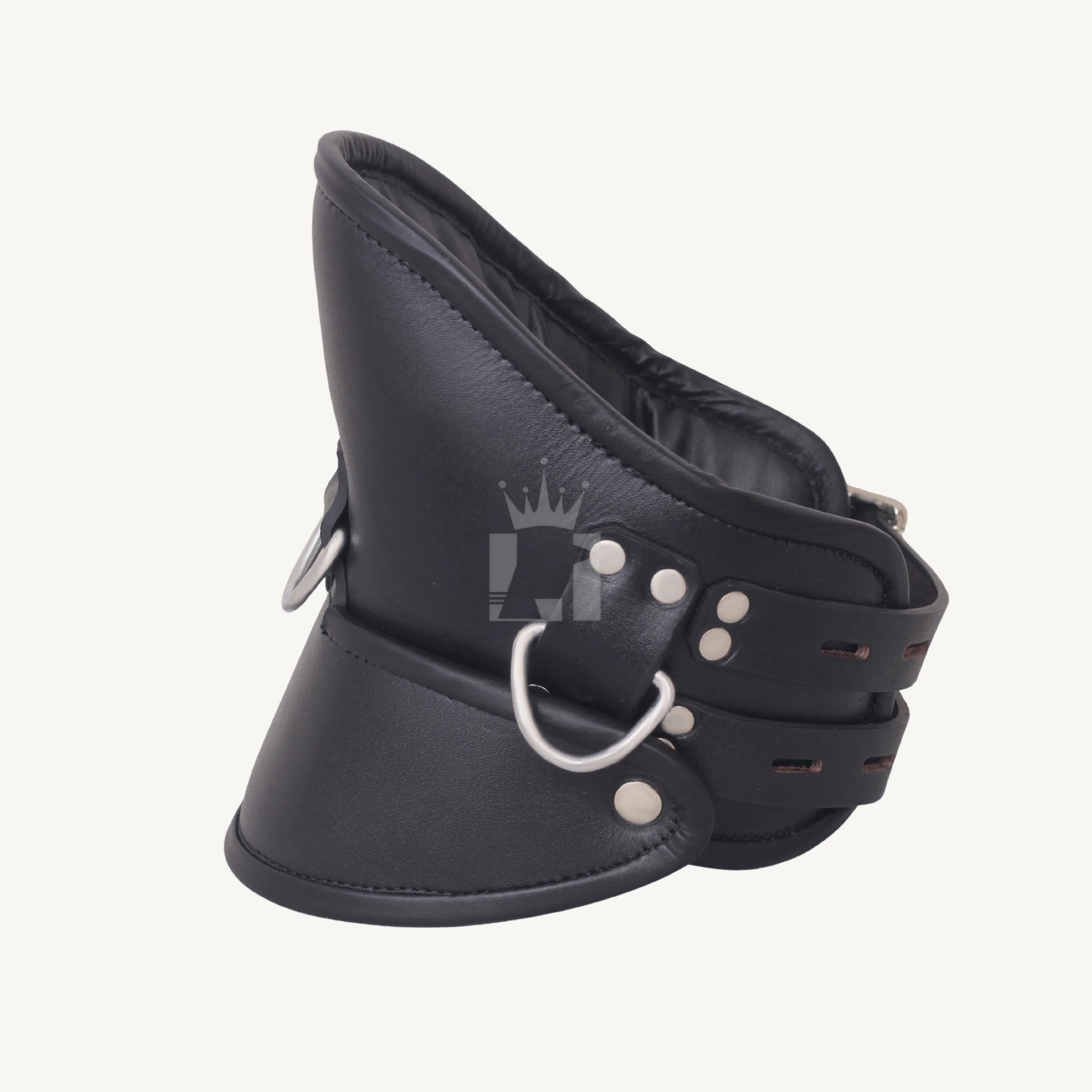 Angled side view of padded black leather bondage collar with two buckle straps.