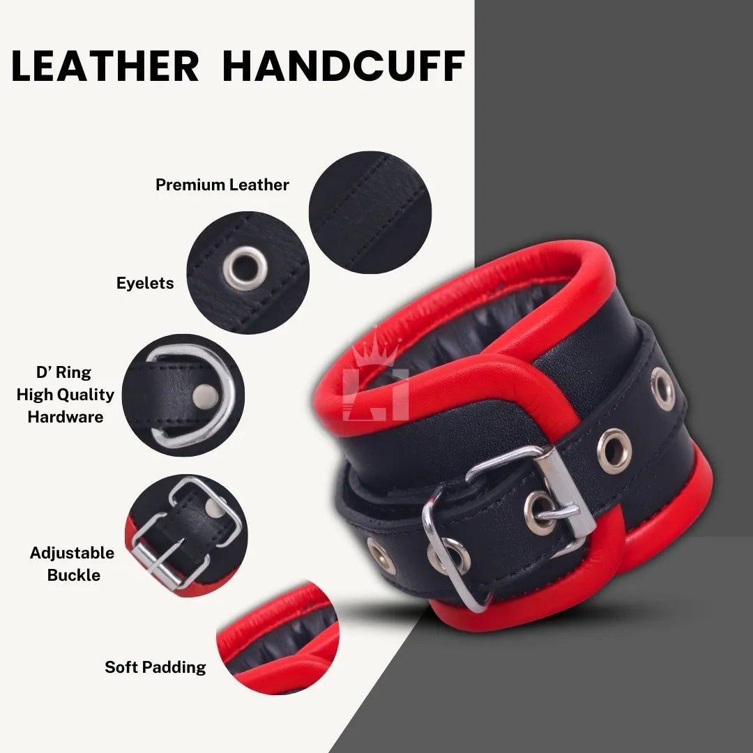 Angled front view of a black and red padded leather handcuff with features highlighted including buckle, D-ring, and eyelets
