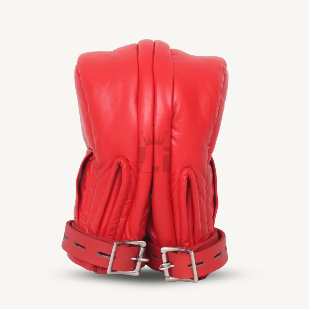 Close back view of red leather locking mittens secured with dual buckle straps.