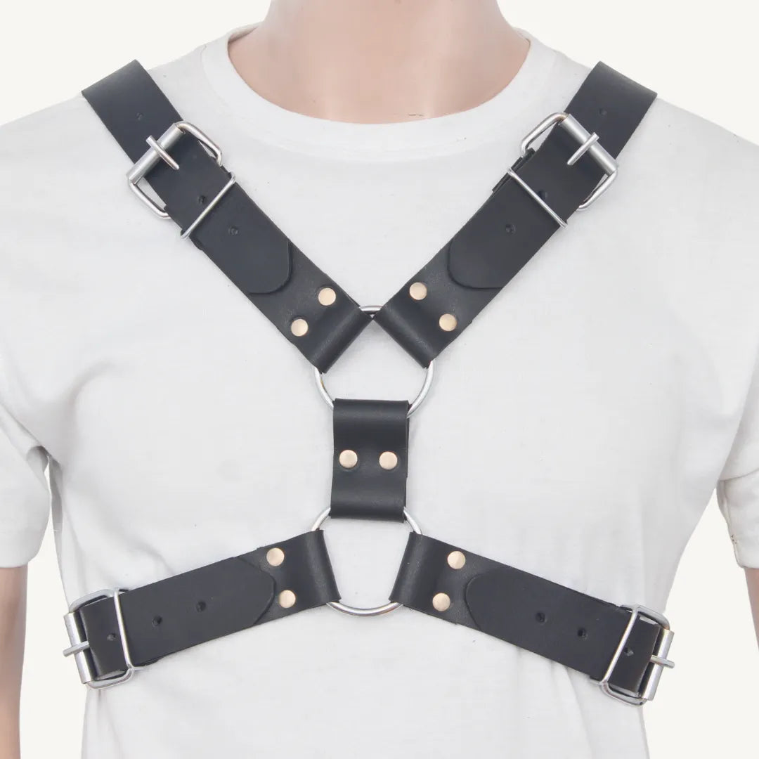 Full front view of leather harness with dual O-rings, adjustable buckles, and rivet details.