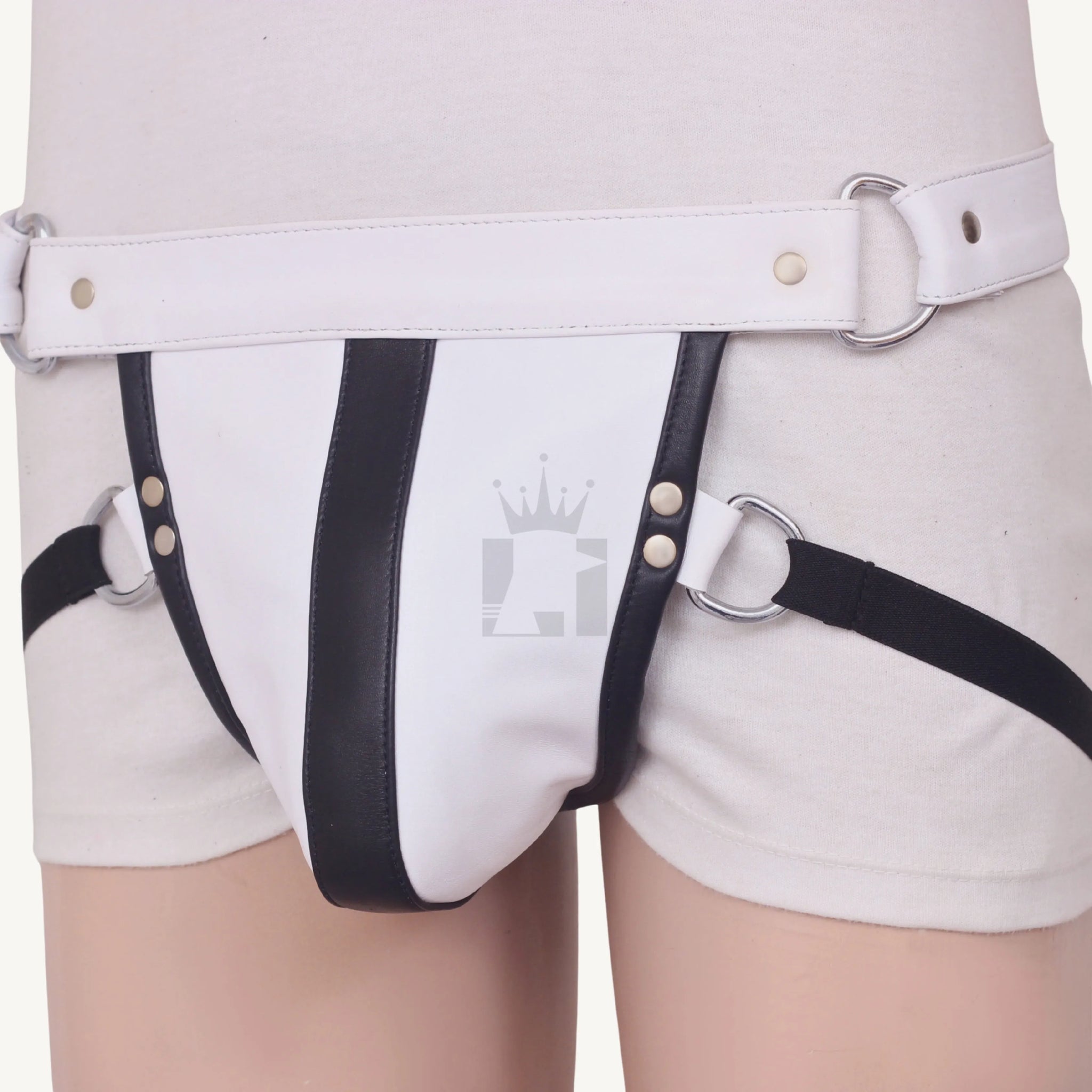 White leather jockstrap with central black stripe, metal studs, and side D-ring accents.
