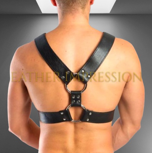 Backside  image of model wearing Gay Leather Chest Harness