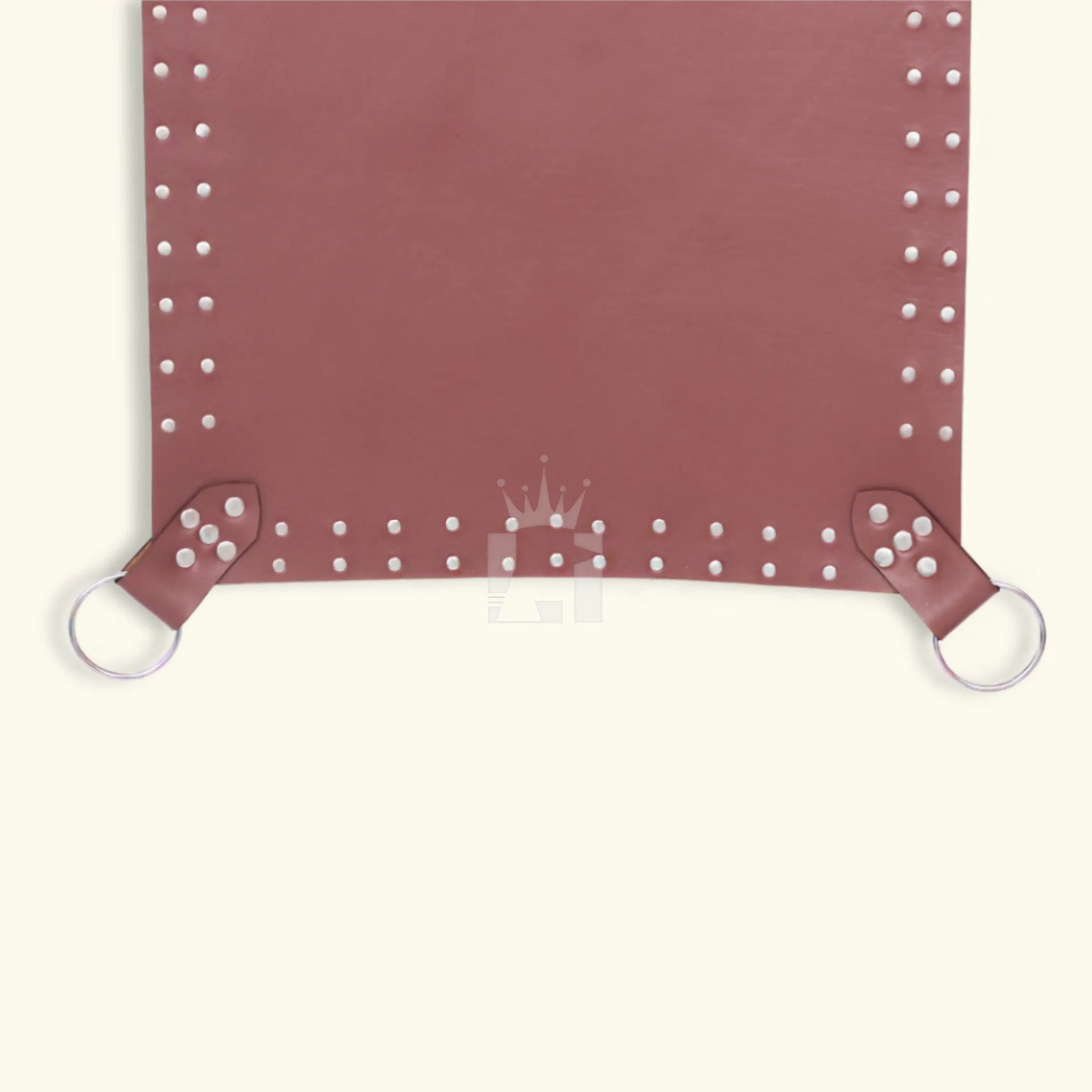 Close-up of brown leather Sex sling bottom showing riveted edges and heavy-duty O-ring attachments.