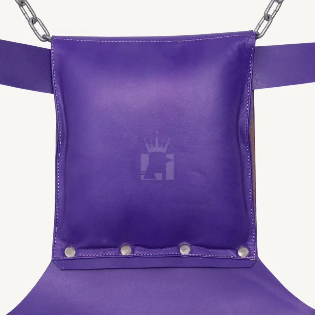 Close-up of the purple leather Sex sling padded pillow with reinforced stitching and rivet details.
