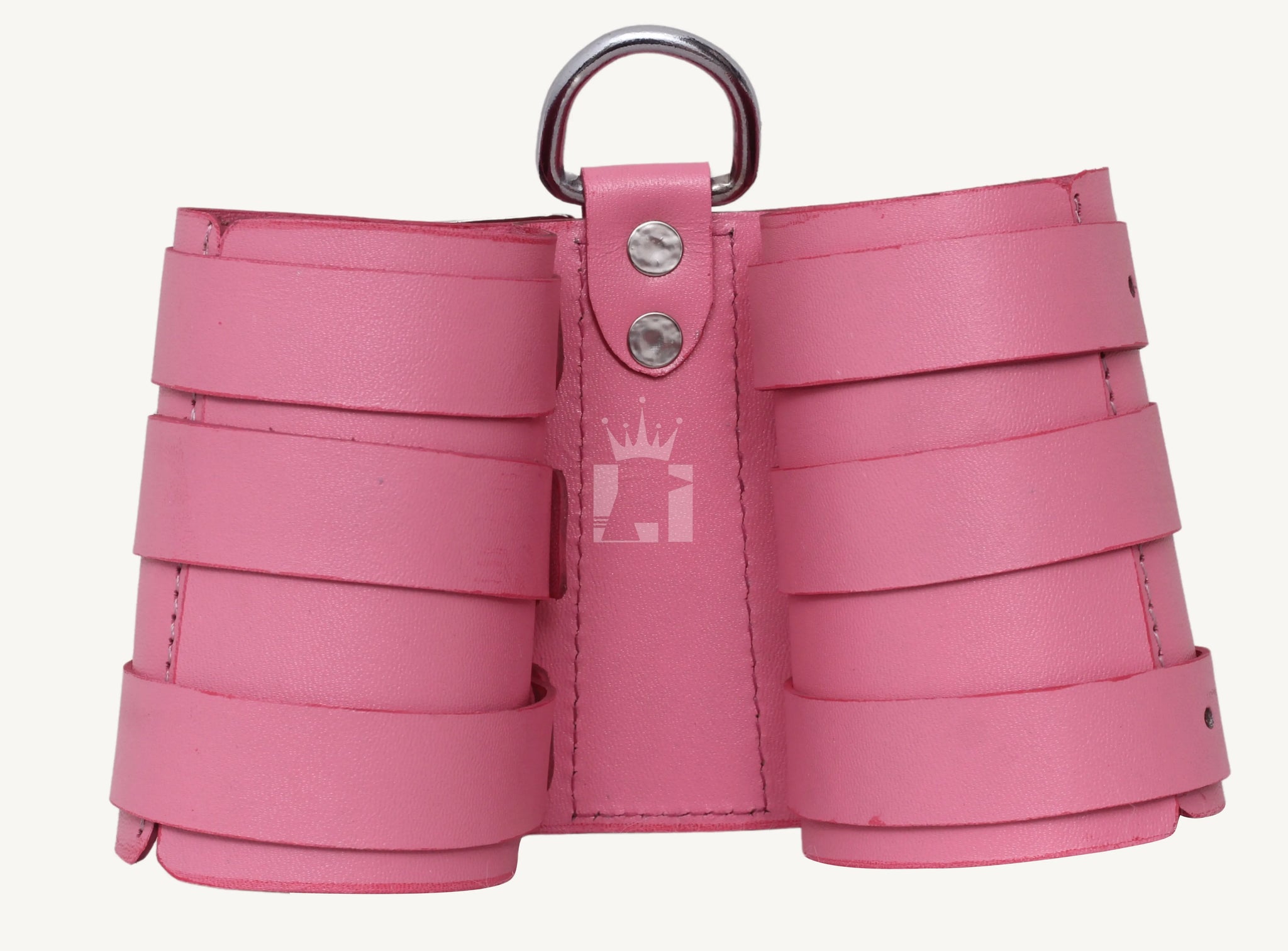 Rear view of pink leather bondage cuffs with reinforced stitching and steel rivets for durability.