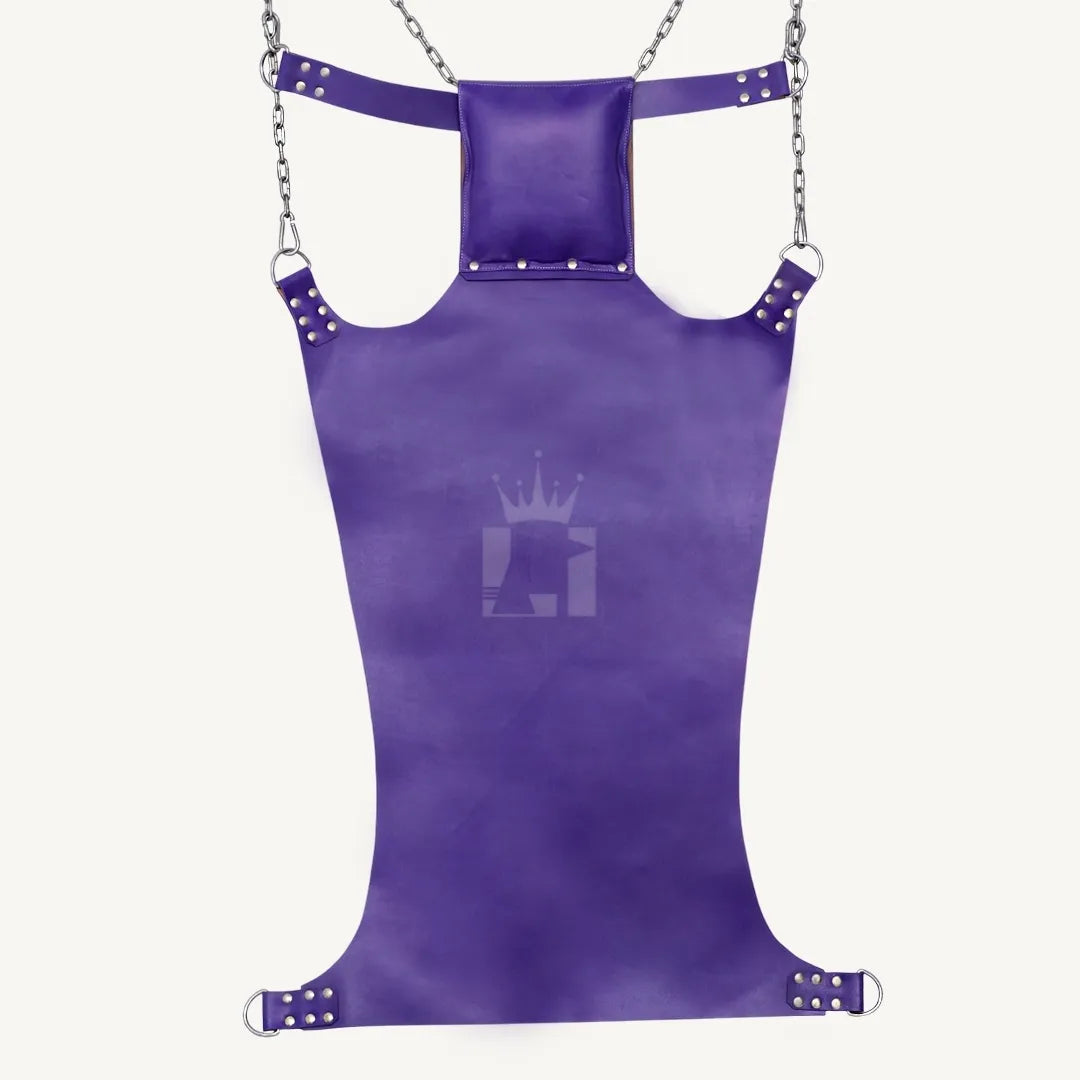 Full back view of the purple leather sling with chains, riveted straps, pillow, and D-ring hardware.