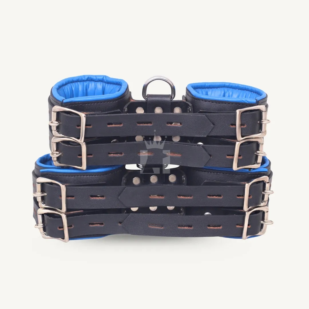 Back view of black and blue padded leather suspension cuffs featuring double adjustable buckle straps and riveted design.