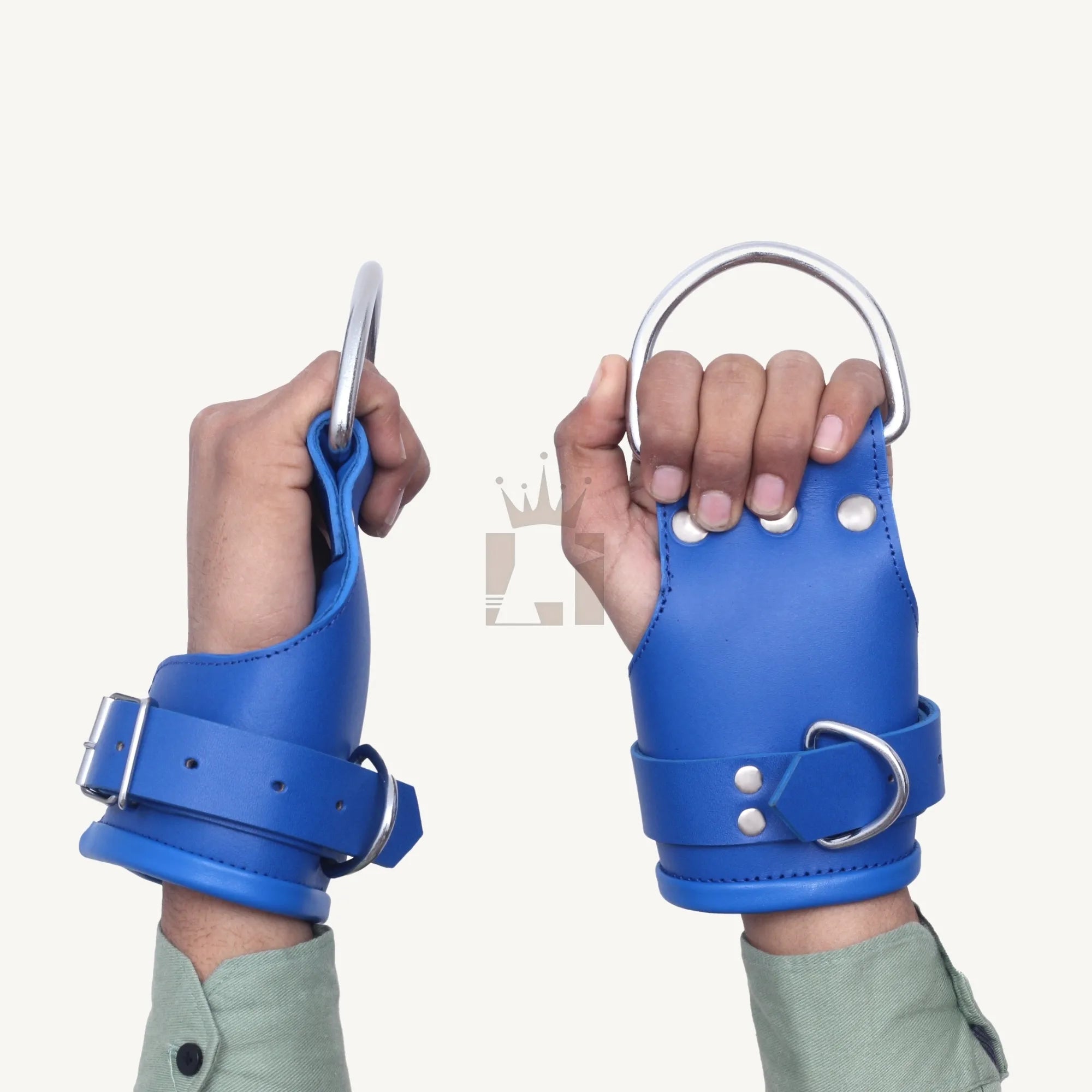 Side view of blue suspension wrist cuffs with strong rivets, metal D-rings, and adjustable straps.