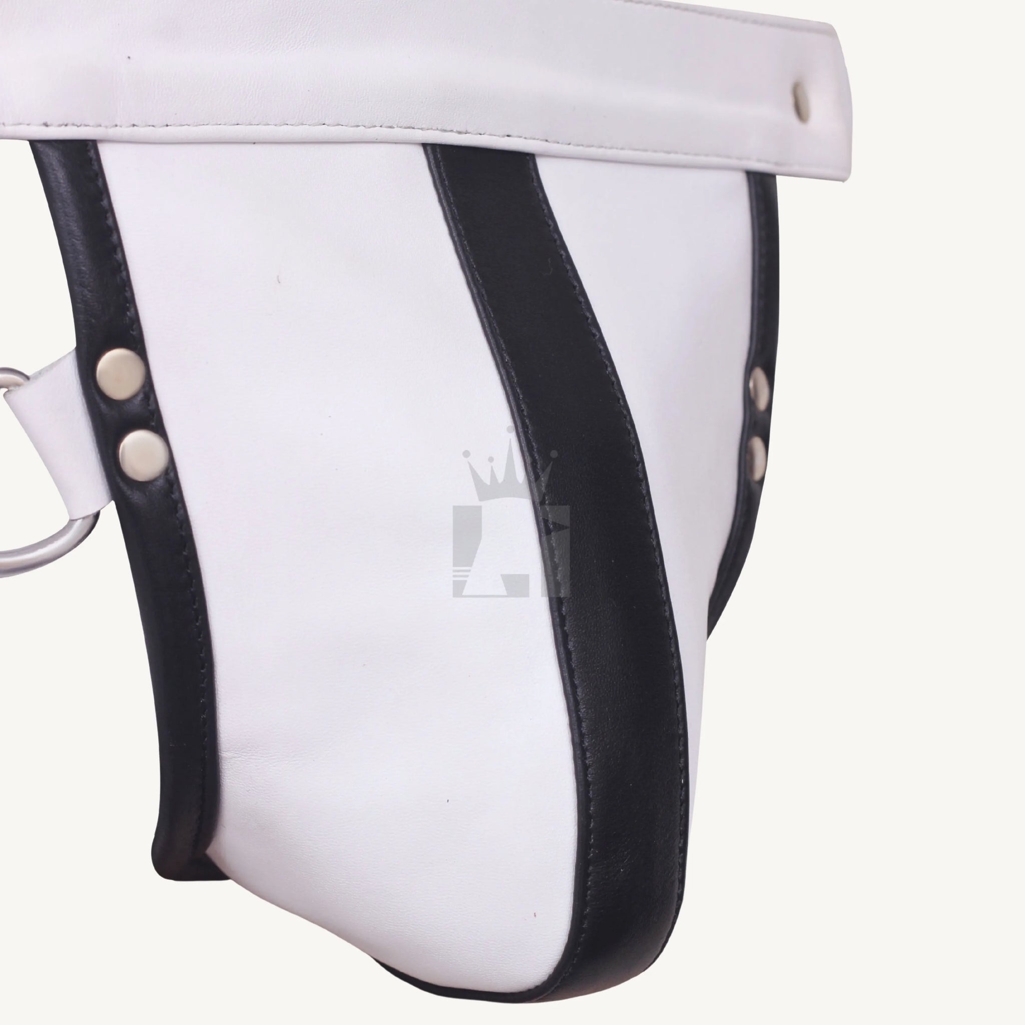 White leather jockstrap Codpiece with central black stripe and reinforced stitching along edges.