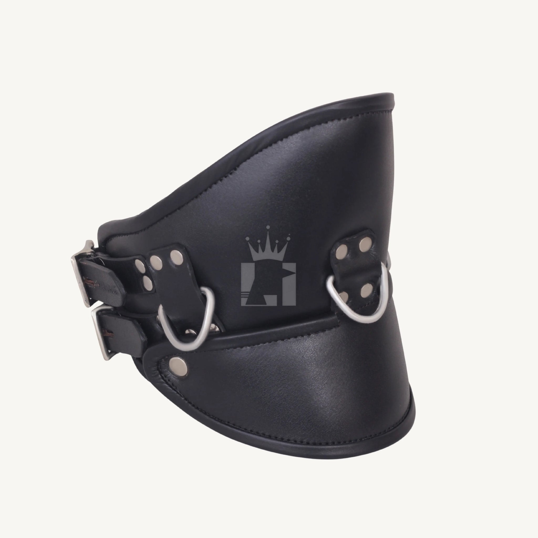 Side profile of black leather bondage neck collar with metal D-rings and buckles.