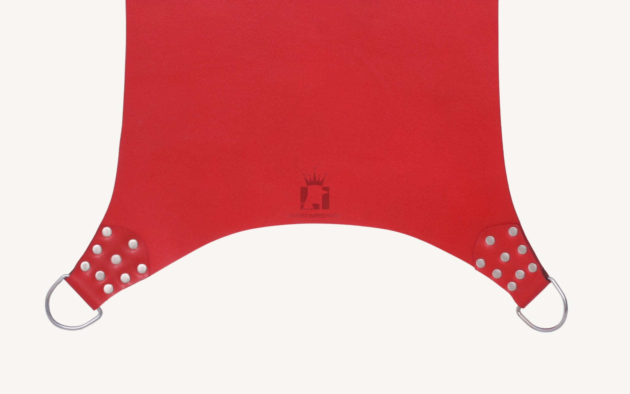 close-up shot of red leather sex swing with nickel-plated reverts 